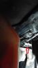 Looking up at the underside of the bonnet catch from the wheel arch.jpg